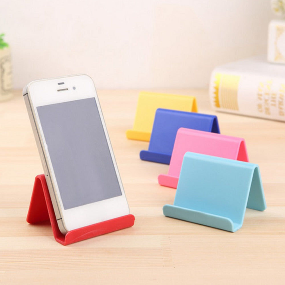 "Stylish mini phone holder enhancing desk organization and functionality."