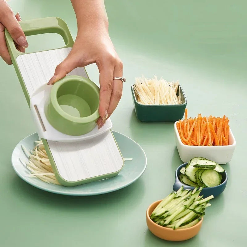 "Versatile Vegetable Cutter for Slicing, Grating, and Julienne Cuts"